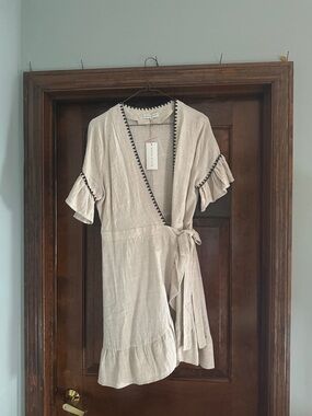 Moon River Cream Wrap Dress with Black Trim